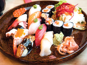 Close-up of sushi served on table