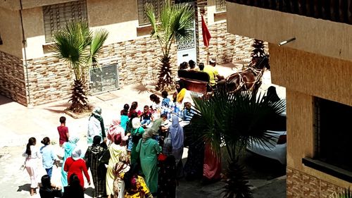 High angle view of people on building in city