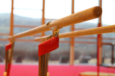 Close-up of padlocks on metal railing