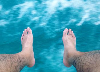 Low section of woman in water