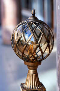 Close-up of electric lamp on table