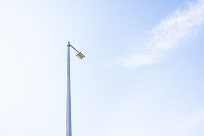 Low angle view of street light against sky
