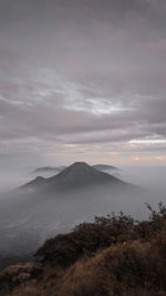 Scenic view of landscape against sky during sunset