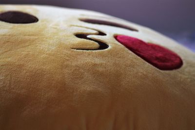 Close-up of red ball on table