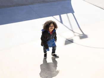 High angle view of woman standing in winter