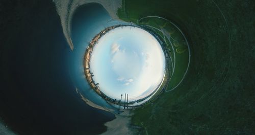 High angle view of sky seen through hole