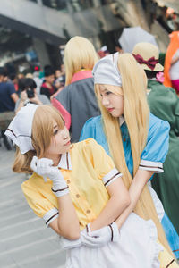 Rear view of women in traditional clothing