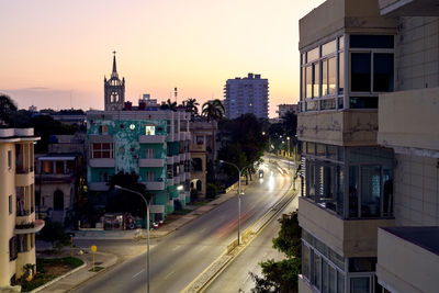 High angle view of city at sunset