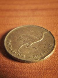 Close-up of coins on table