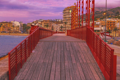 View of buildings against sky at sunset