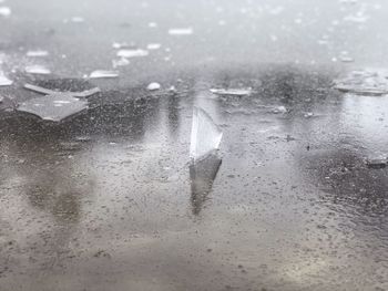 Full frame shot of wet glass window in rainy season