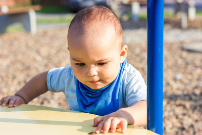 Cute boy playing in playground