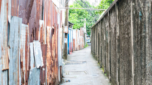 Alley amidst buildings in city