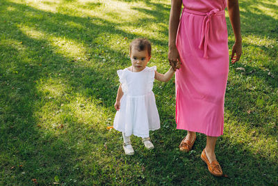 Women standing on grass