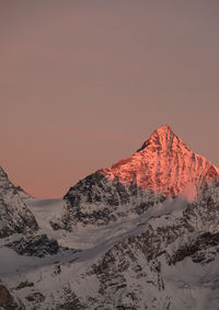 Scenic view of mountains against dramatic sky