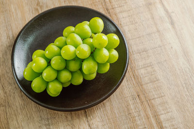 High angle view of fruits in bowl on table