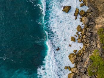 High angle view of rocks on beach