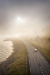 Aerial view of highway against sky