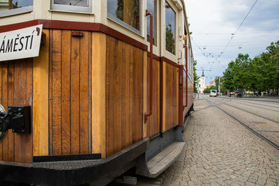 Road by buildings in city