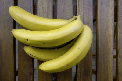 Close-up of bananas on wooden wall