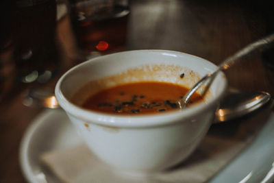 Close-up of coffee cup on table