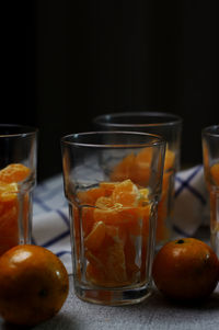 Close-up of drink on table against black background