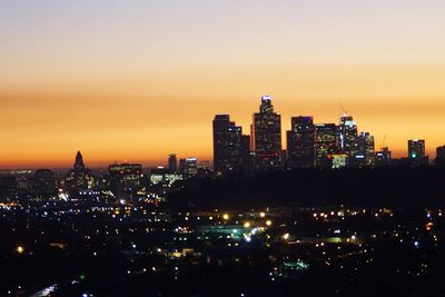 Illuminated cityscape at night