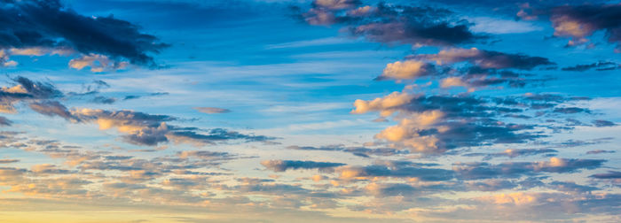 Low angle view of clouds in sky during sunset