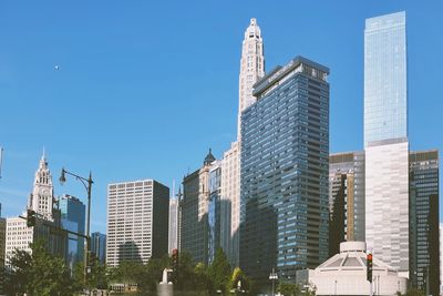 Low angle view of skyscrapers against sky