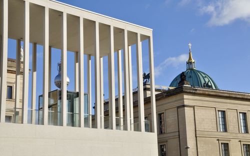 Low angle view of building against blue sky