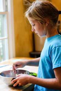 Close-up of girl in kitchen