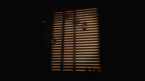 Close-up of window in darkroom