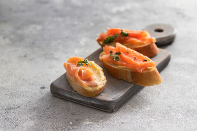 Close-up of orange slice in plate on table