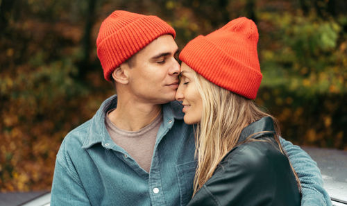 Tender loving relationship in a couple. close-up of a man hugging a woman.