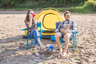 People sitting on land