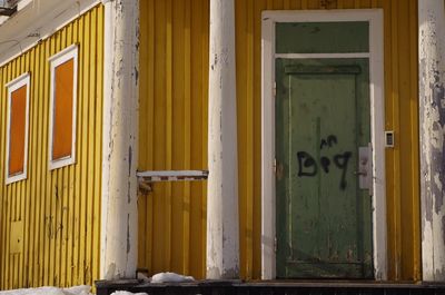 Close-up of yellow door