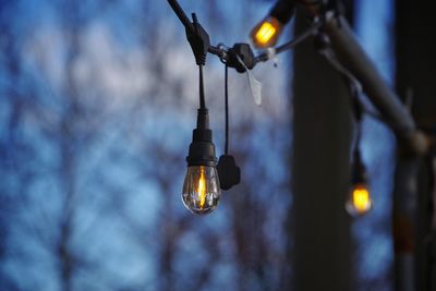 Close-up of illuminated light bulb