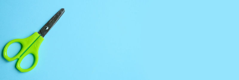 Close-up of pencils against blue background
