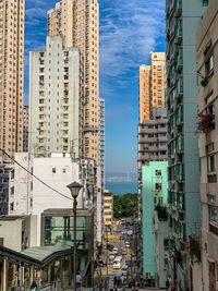 Modern buildings in city against sky