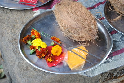 The entire prayer materials are accumulated and decorated in plate.