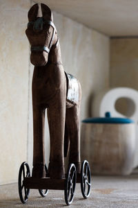 Rocking horse on floor at home