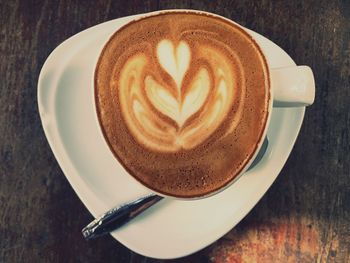 High angle view of cappuccino on table