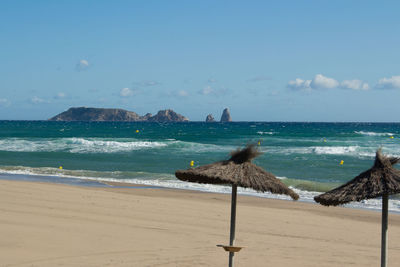 Scenic view of beach against sky