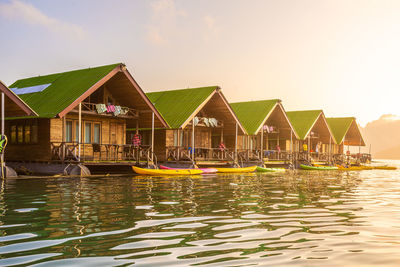 Floating bangalows at cheow lan dam or ratchaprapa dam in surat thani, thailand