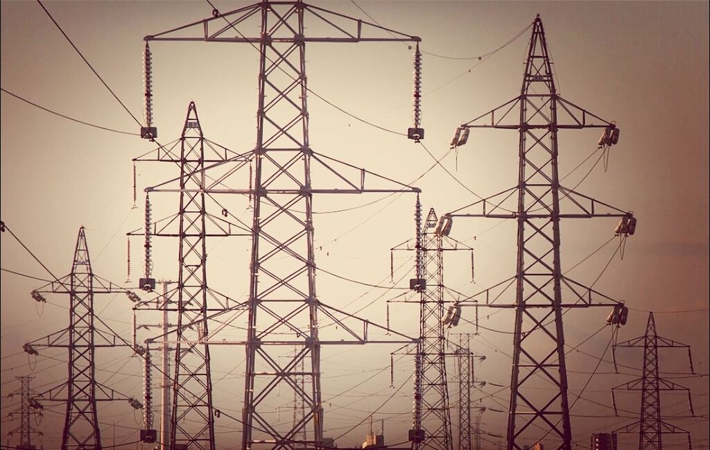 electricity pylon, power line, electricity, power supply, fuel and power generation, technology, low angle view, connection, cable, silhouette, sunset, complexity, clear sky, sky, electricity tower, outdoors, no people, dusk, tall - high, power cable