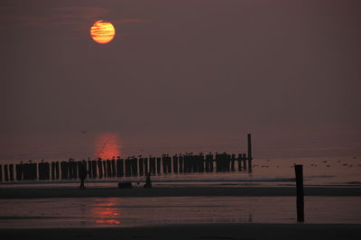 Scenic view of sea against sky during sunset in domburg, in the dutch province of zeeland