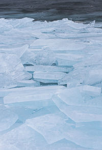 Full frame shot of ice floating on water