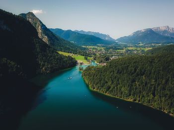 Aerial view of river passing through mountains