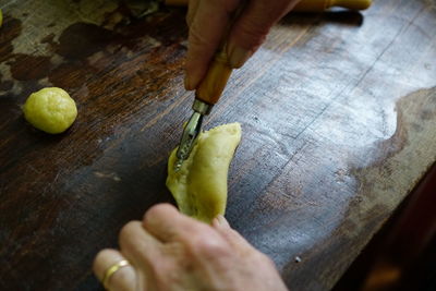 Close-up of person preparing food