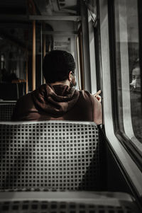 Man sitting in train